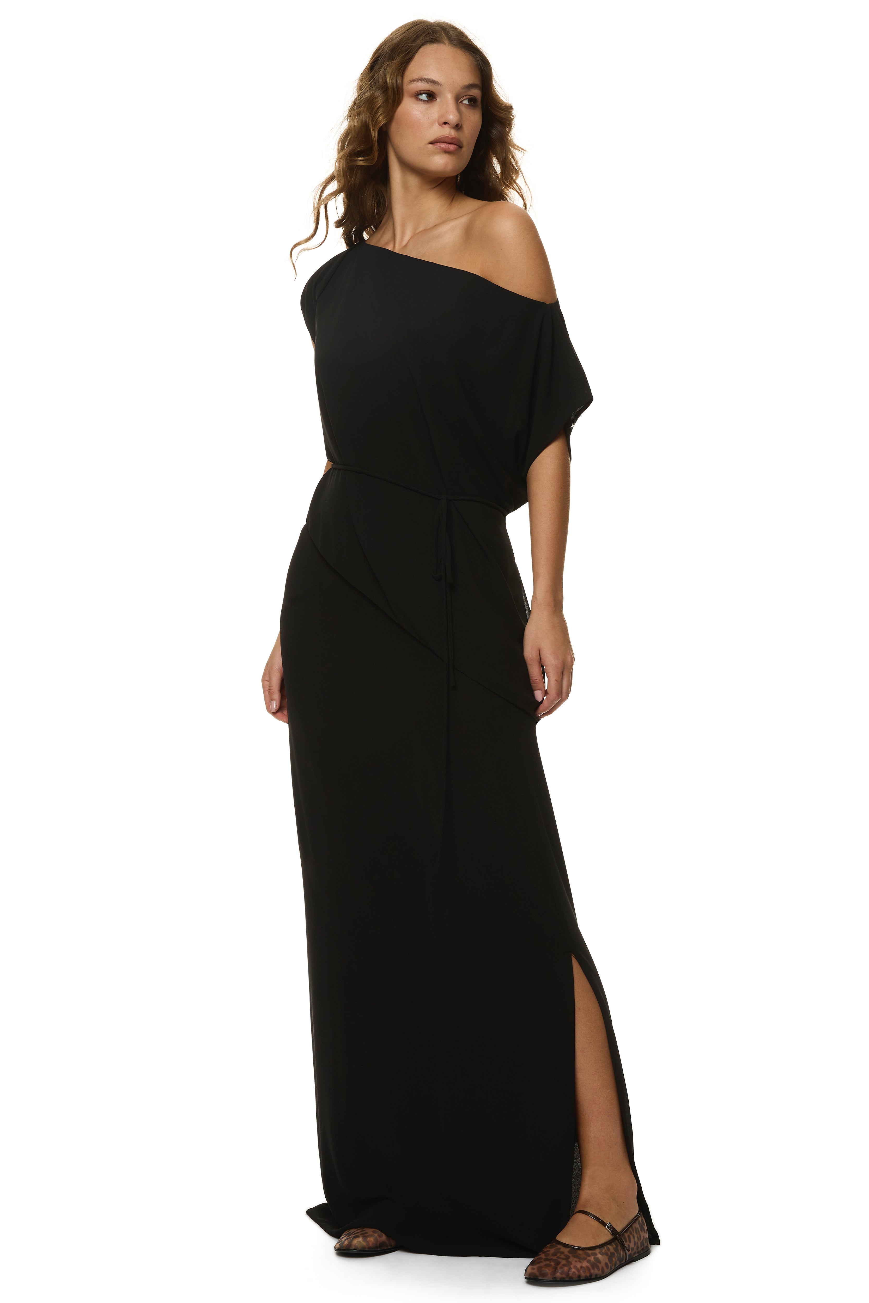 Juliette Maxi Skirt in sheer lightweight fabrication with full lining, panel detailing, and side slit, styled for summer soirées and resort dinners.